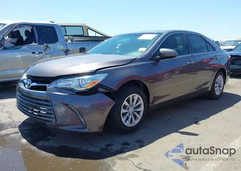2016 Toyota Camry Le z USA, uszkodzony, nr VIN 4T4BF1FK1GR542427